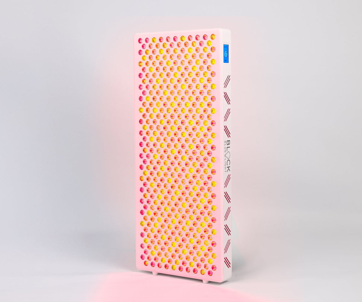 BlockBlueLight Mega Plus red light therapy panel lit, full front lifestyle view